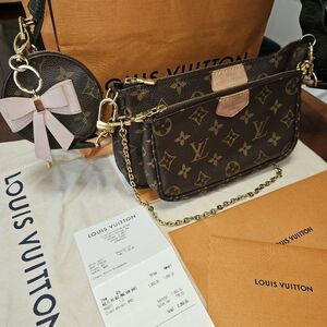 Louis Vuitton Authentic multi-pochette /double clutch